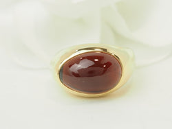 Bague POMELLATO en or jaune et grenat - Castafiore