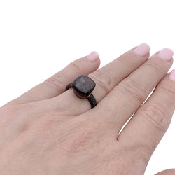 Bague POMELLATO Nudo en or rose, titane, obsidienne, diamants noirs. - Castafiore