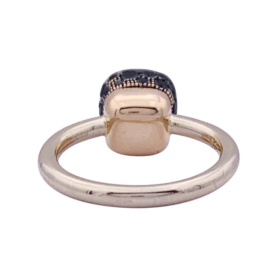 Bague Pomellato, "Nudo Solitaire", deux ors, diamants traités noirs. - Castafiore
