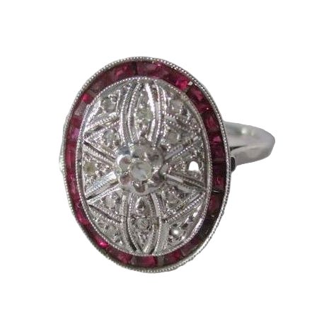 Bague Pompadour en or blanc, rubis et diamants - Castafiore