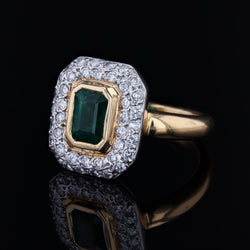 Bague rectangulaire en or jaune et blanc avec émeraude et diamants - Castafiore