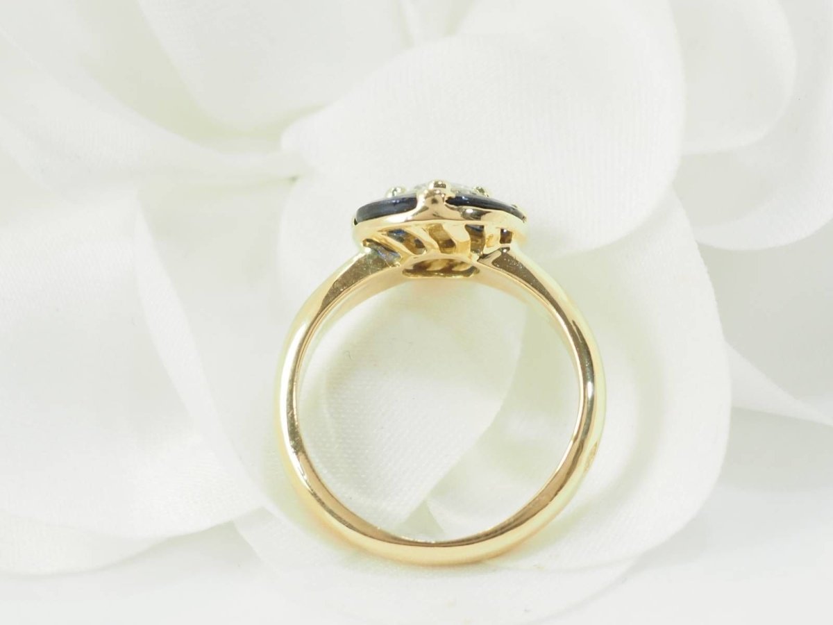 Bague ronde en or jaune, saphirs et diamant - Castafiore