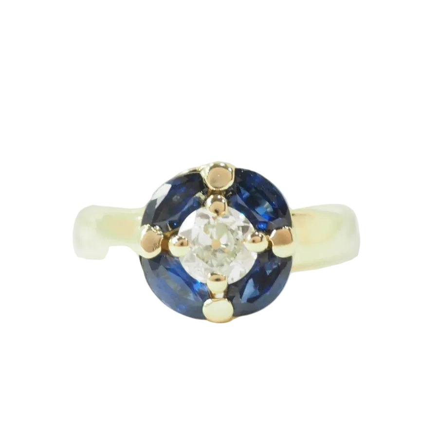 Bague ronde en or jaune, saphirs et diamant - Castafiore