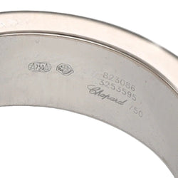 Bague Solitaire CHOPARD "Happy Diamond" en or blanc, saphir et diamant - Castafiore