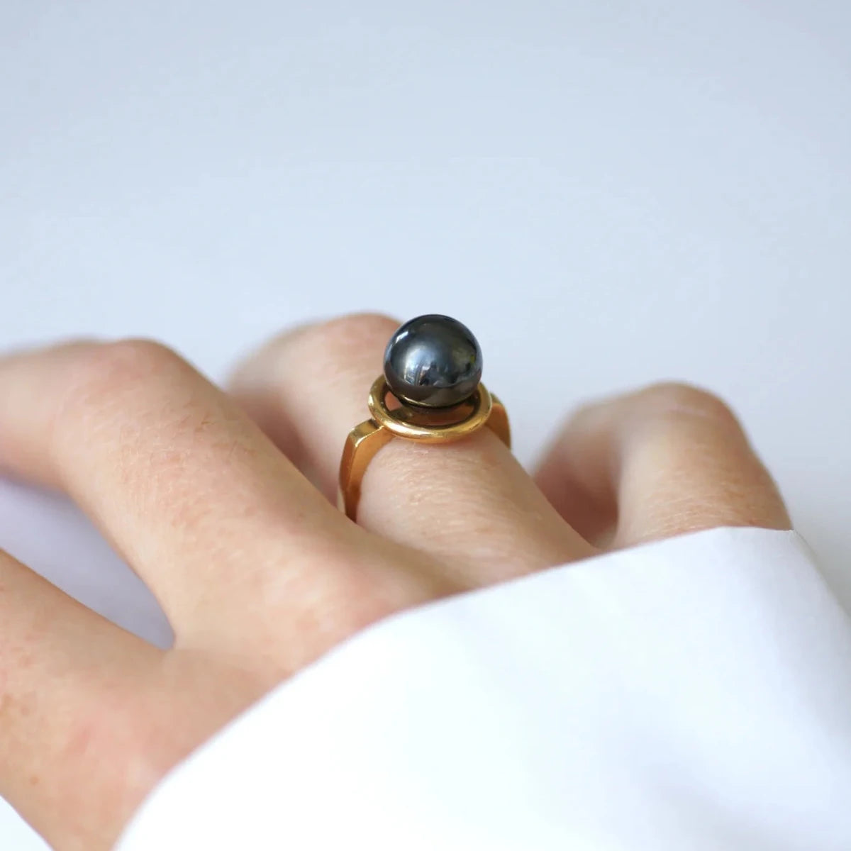 Bague Solitaire DINH VAN en or jaune et hématite - Castafiore