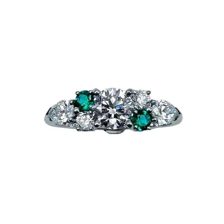 Bague Solitaire en or blanc, diamants et émeraudes - Castafiore