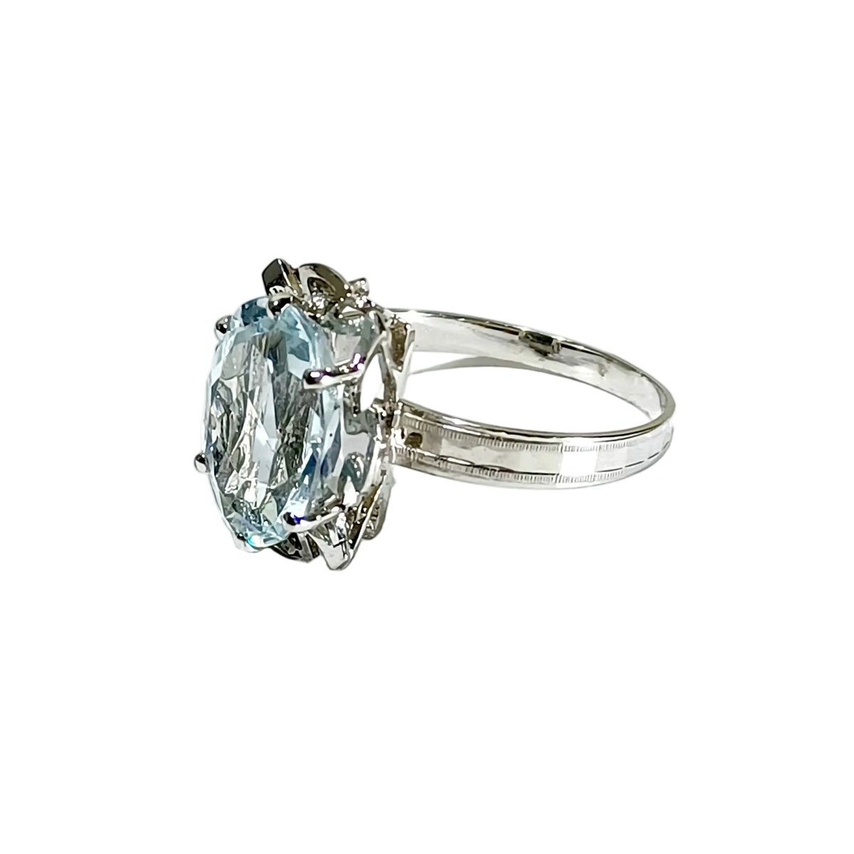 Bague Solitaire en or blanc et aigue - marine - Castafiore