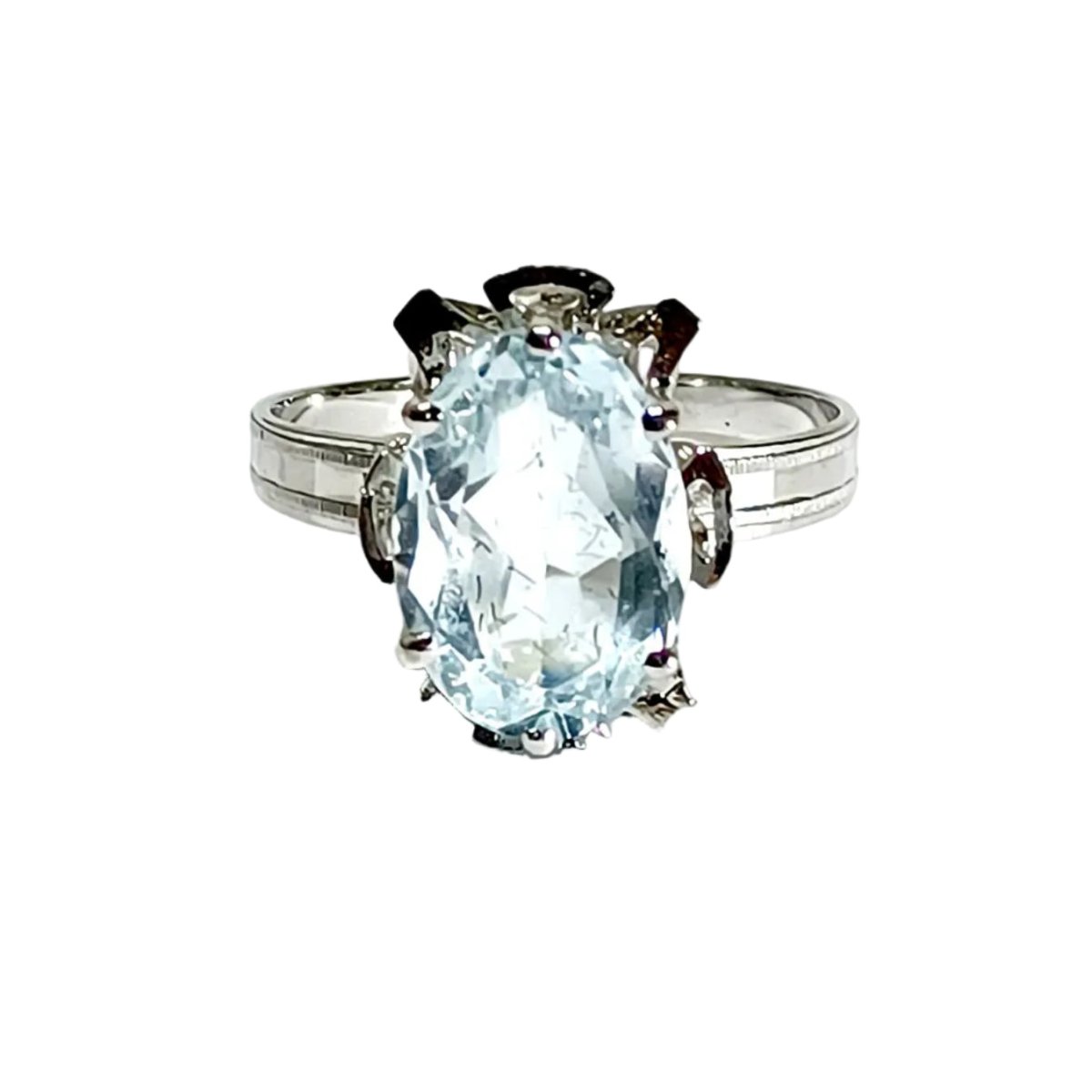 Bague Solitaire en or blanc et aigue - marine - Castafiore