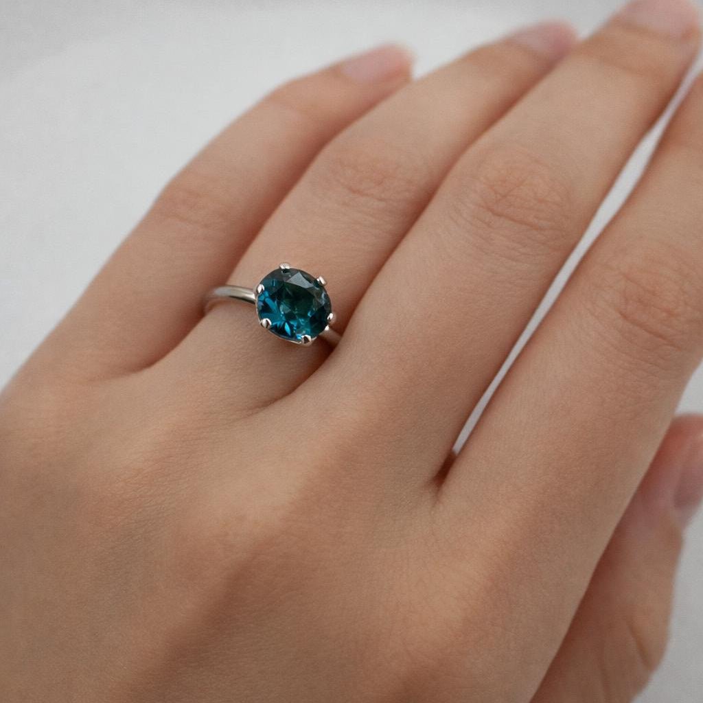 Bague Solitaire en or blanc et topaze - Castafiore