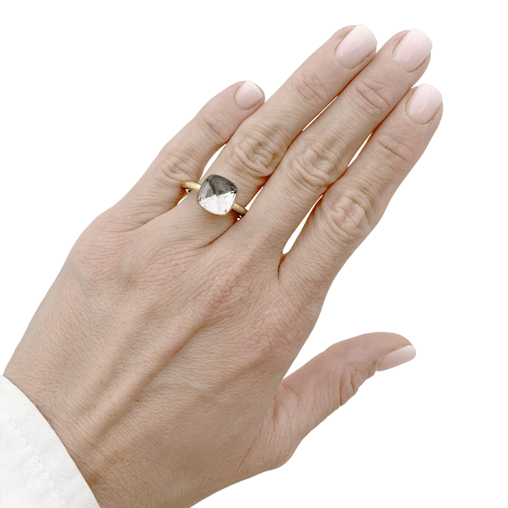 Ring Pomellato, "Nudo Classique", two golds and white topaz.