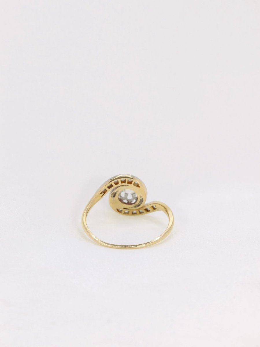Bague tourbillon en or et diamant taille ancienne - Castafiore