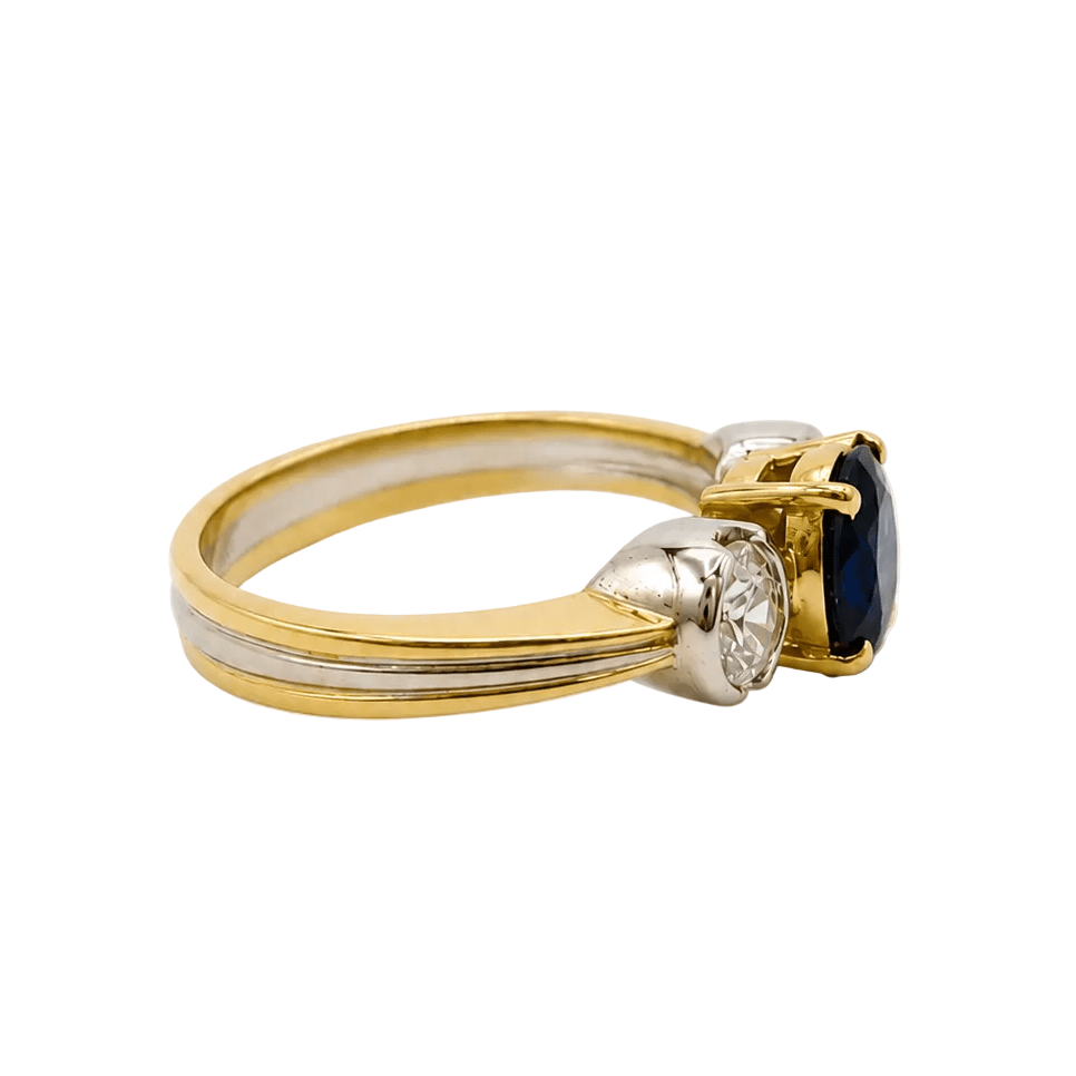 Bague Trilogie en or blanc, or jaune, saphir et diamants - Castafiore