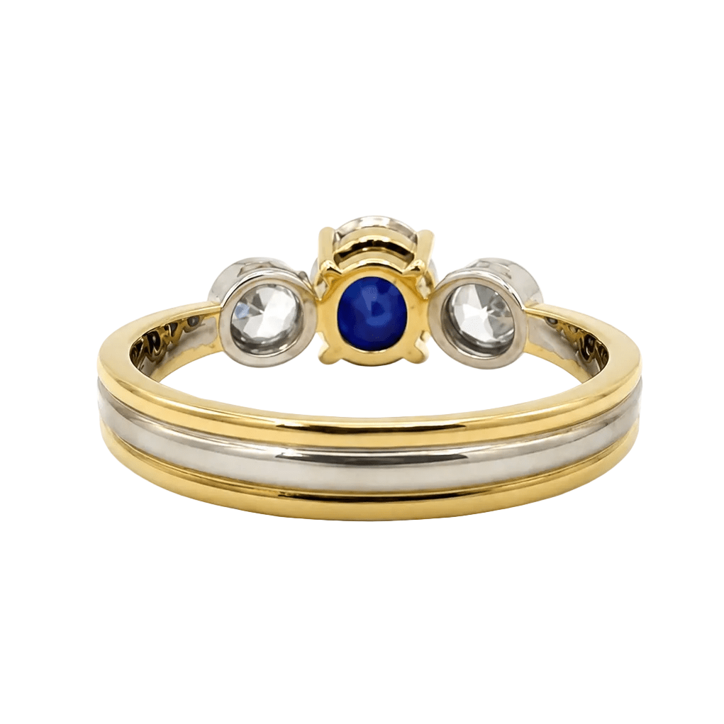 Bague Trilogie en or blanc, or jaune, saphir et diamants - Castafiore