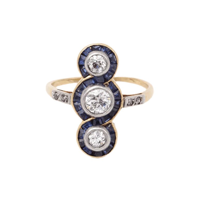 Bague Trilogie en or jaune, platine, saphirs et diamants - Castafiore