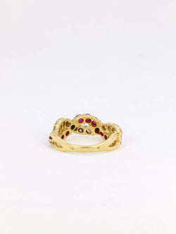 Bague vintage torsadée en or, diamants et rubis - Castafiore