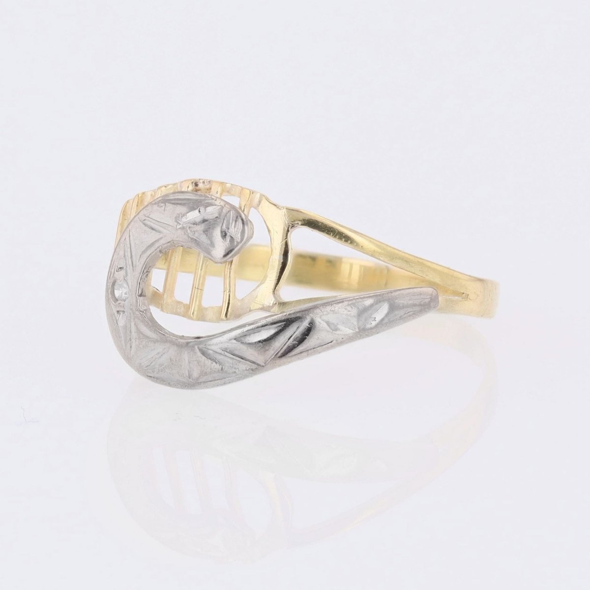 Bague virgule en or jaune et or blanc et diamant - Castafiore
