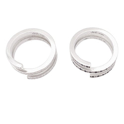 Bagues DINH VAN "Spirale" en or blanc et diamant - Castafiore