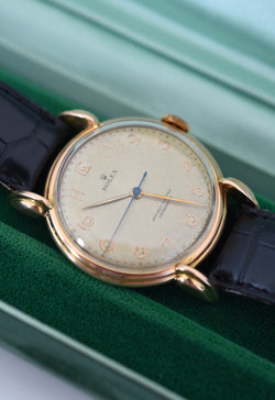 ROLEX "Chronometer" watch in rose gold, steel, and leather