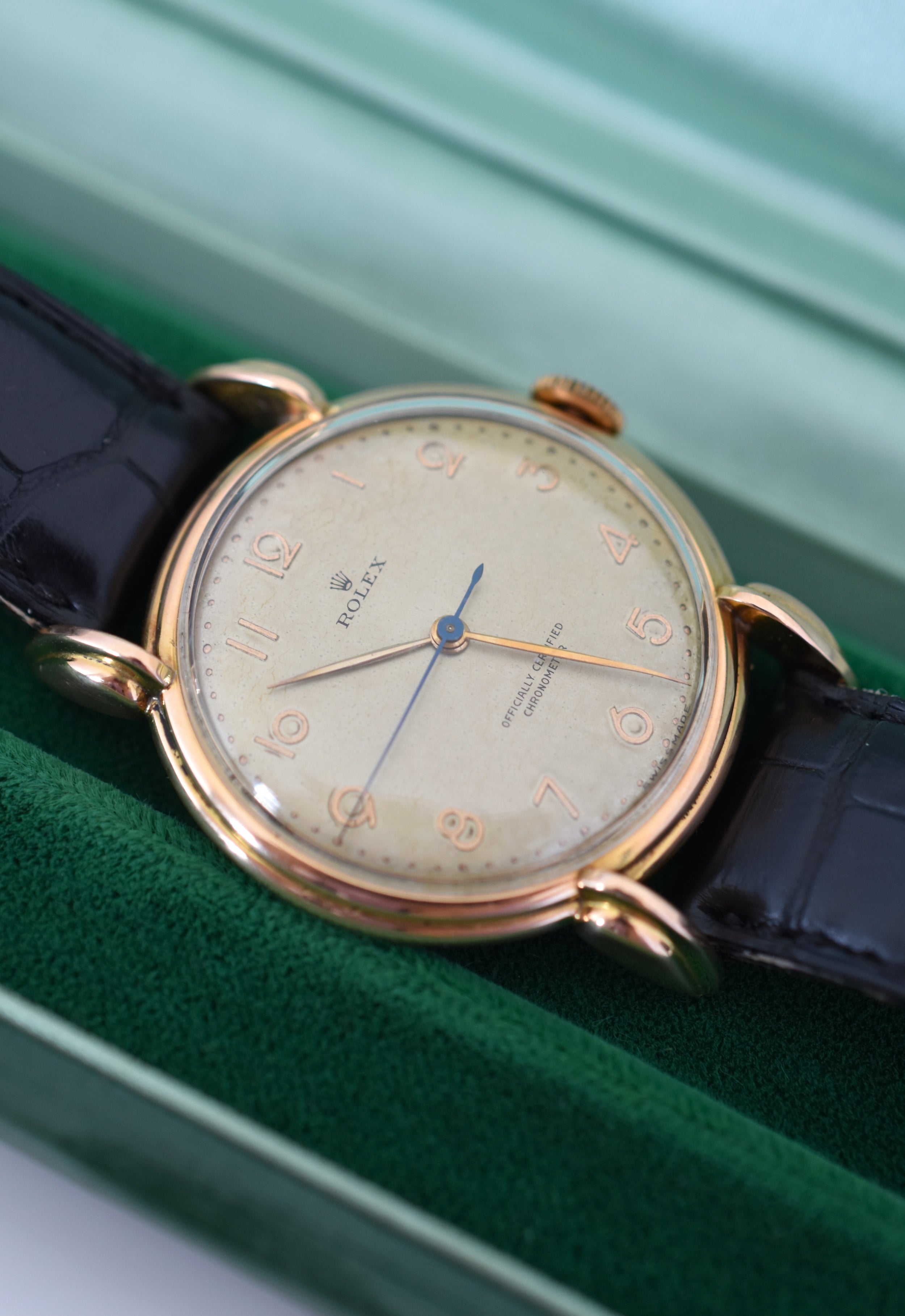 ROLEX "Chronometer" watch in rose gold, steel, and leather