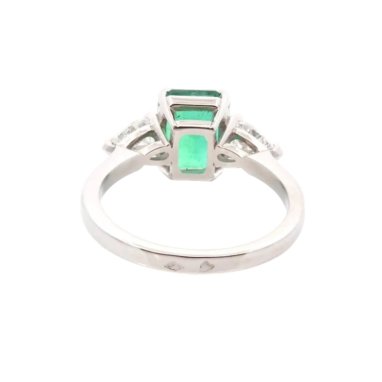 Trilogy Ring in Platinum, Emerald, and Diamonds