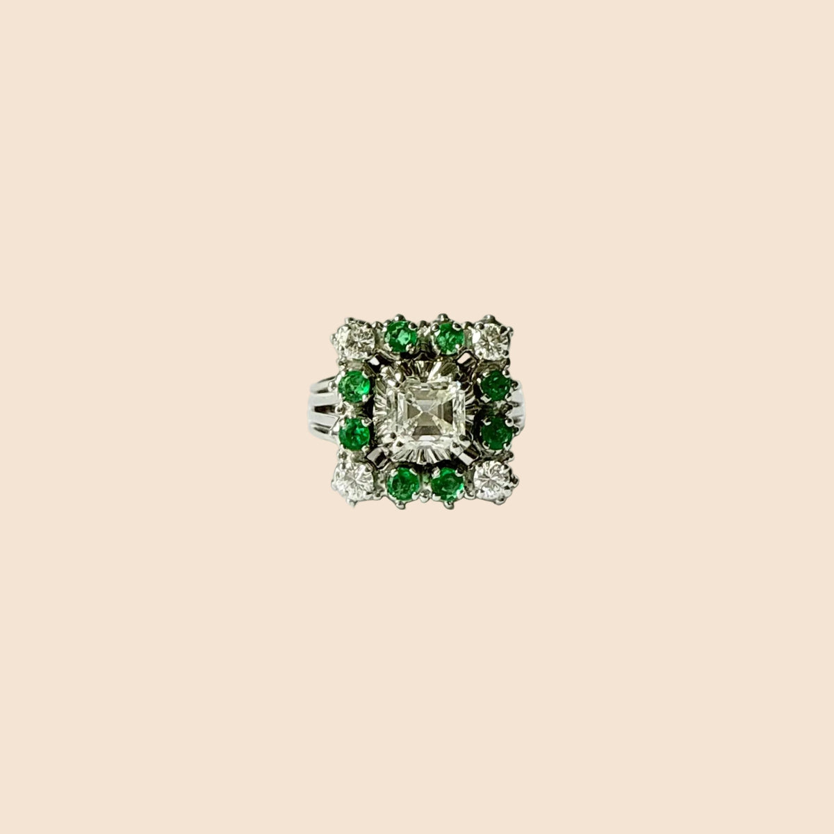 Marguerite Ring in White Gold, Emeralds, and Diamonds