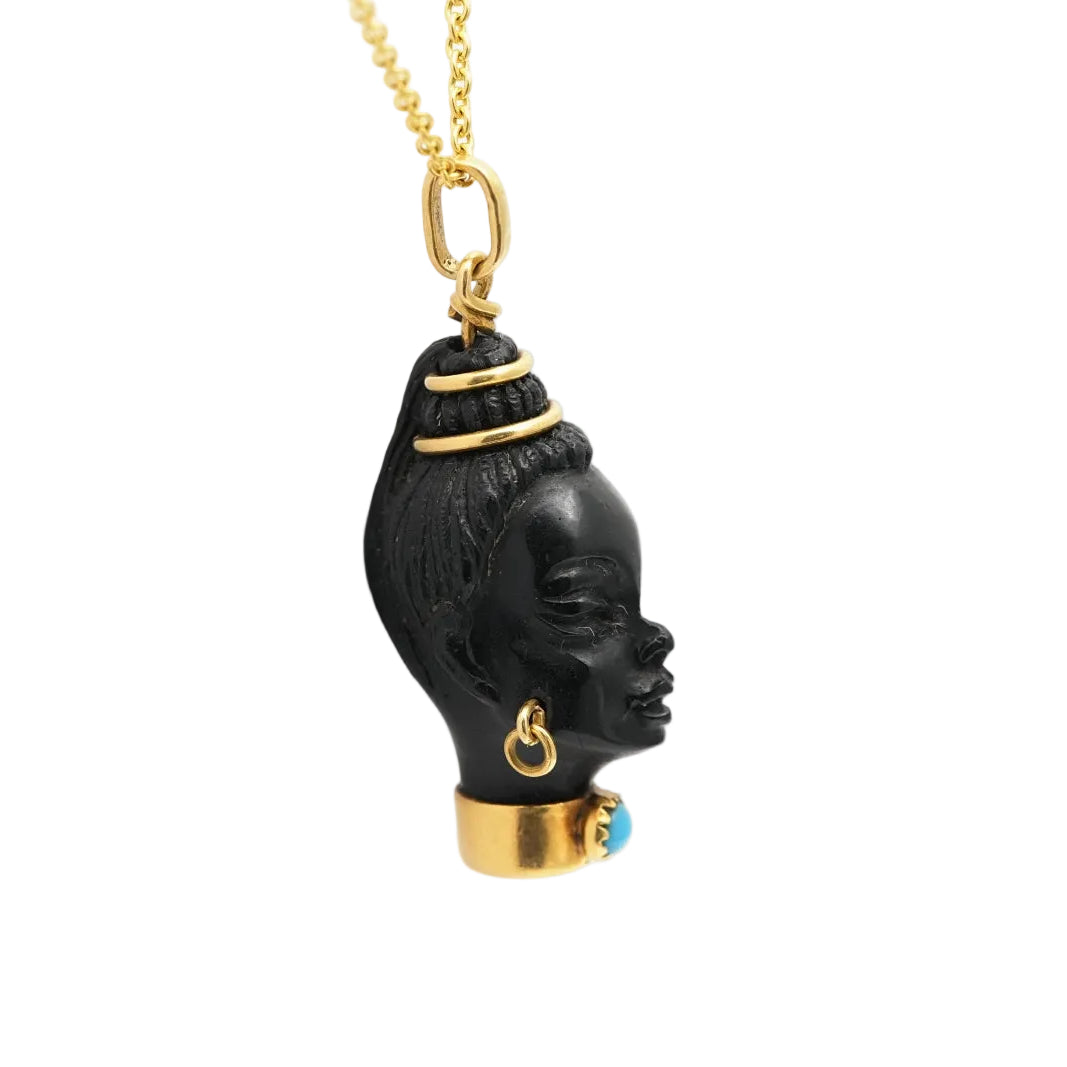 Yellow gold, ebony, and turquoise pendant