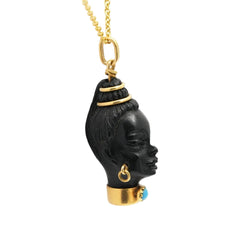 Yellow gold, ebony, and turquoise pendant