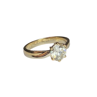 Solitaire Ring in White gold, Yellow gold, and Diamond