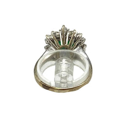 "Entourage" Ring in White Gold, Emeralds, and Diamonds