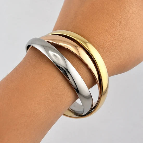 CARTIER "Trinity" bangle in white gold, yellow gold, and rose gold