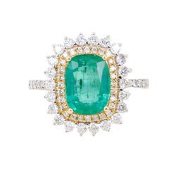 Entourage Ring in white gold, yellow gold, Emerald, and Diamonds