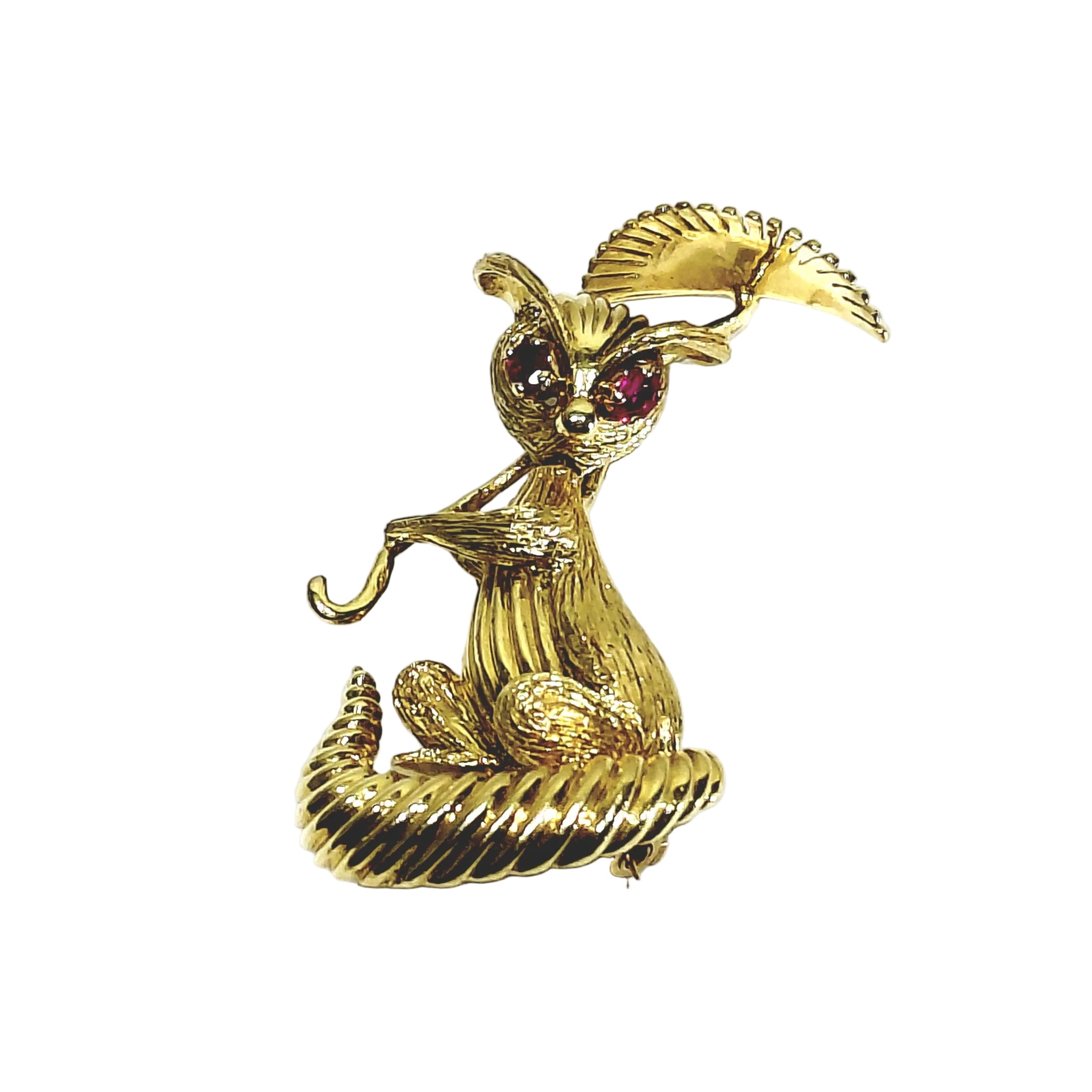 Champagne-colored gold and Ruby brooch