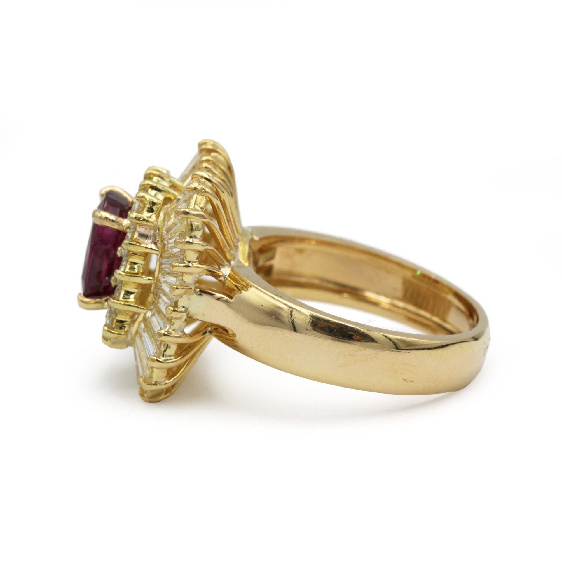 Entourage Ring in yellow gold, rubies, and diamonds