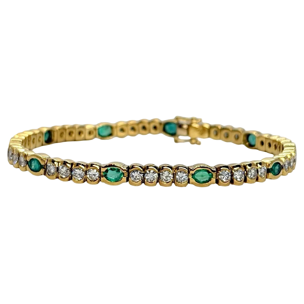 "Ligne" Bracelet in Yellow Gold, Emeralds, and Diamonds