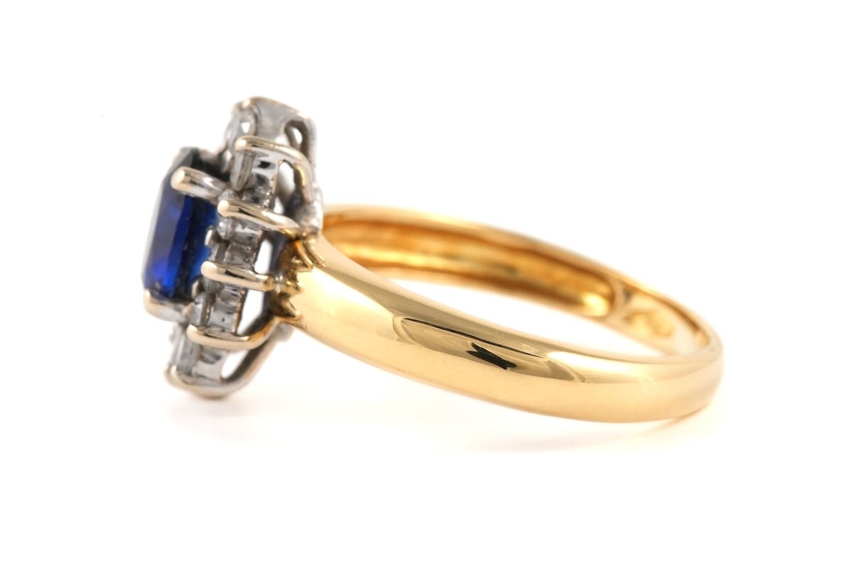 Bague Marguerite en or jaune, saphir et zirconiums