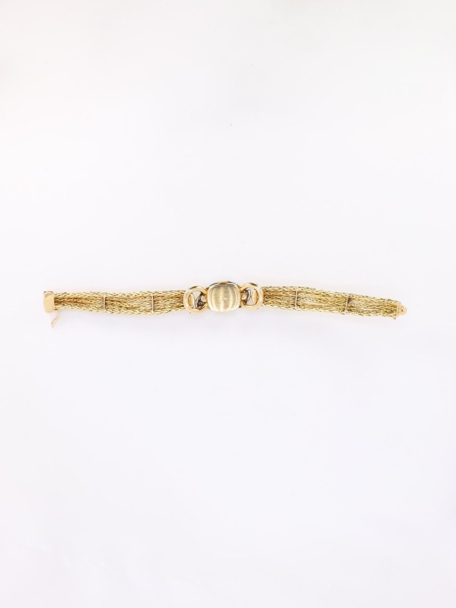 BOUCHERON Montre à secrets or jaune diamants - Castafiore