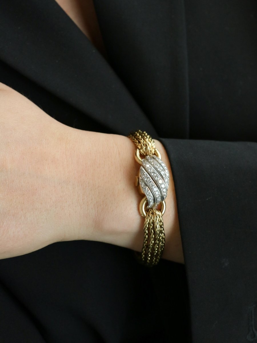 BOUCHERON Montre à secrets or jaune diamants - Castafiore