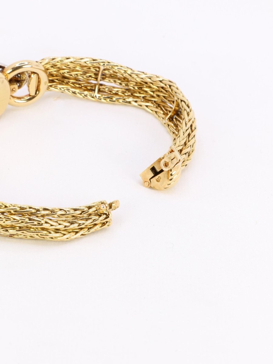 BOUCHERON Montre à secrets or jaune diamants - Castafiore