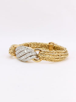 BOUCHERON Montre à secrets or jaune diamants - Castafiore