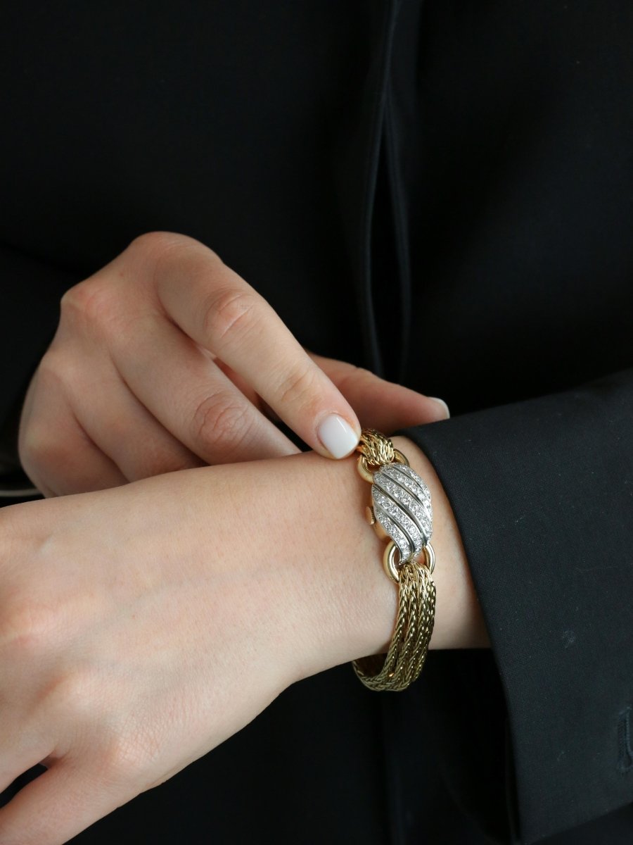 BOUCHERON Montre à secrets or jaune diamants - Castafiore