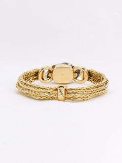 BOUCHERON Montre à secrets or jaune diamants - Castafiore