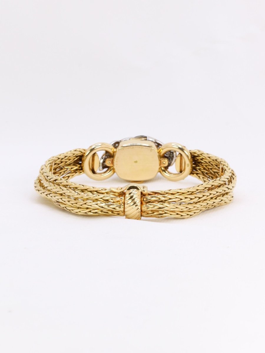 BOUCHERON Montre à secrets or jaune diamants - Castafiore