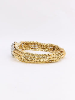 BOUCHERON Montre à secrets or jaune diamants - Castafiore