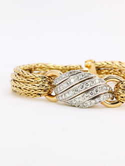 BOUCHERON Montre à secrets or jaune diamants - Castafiore