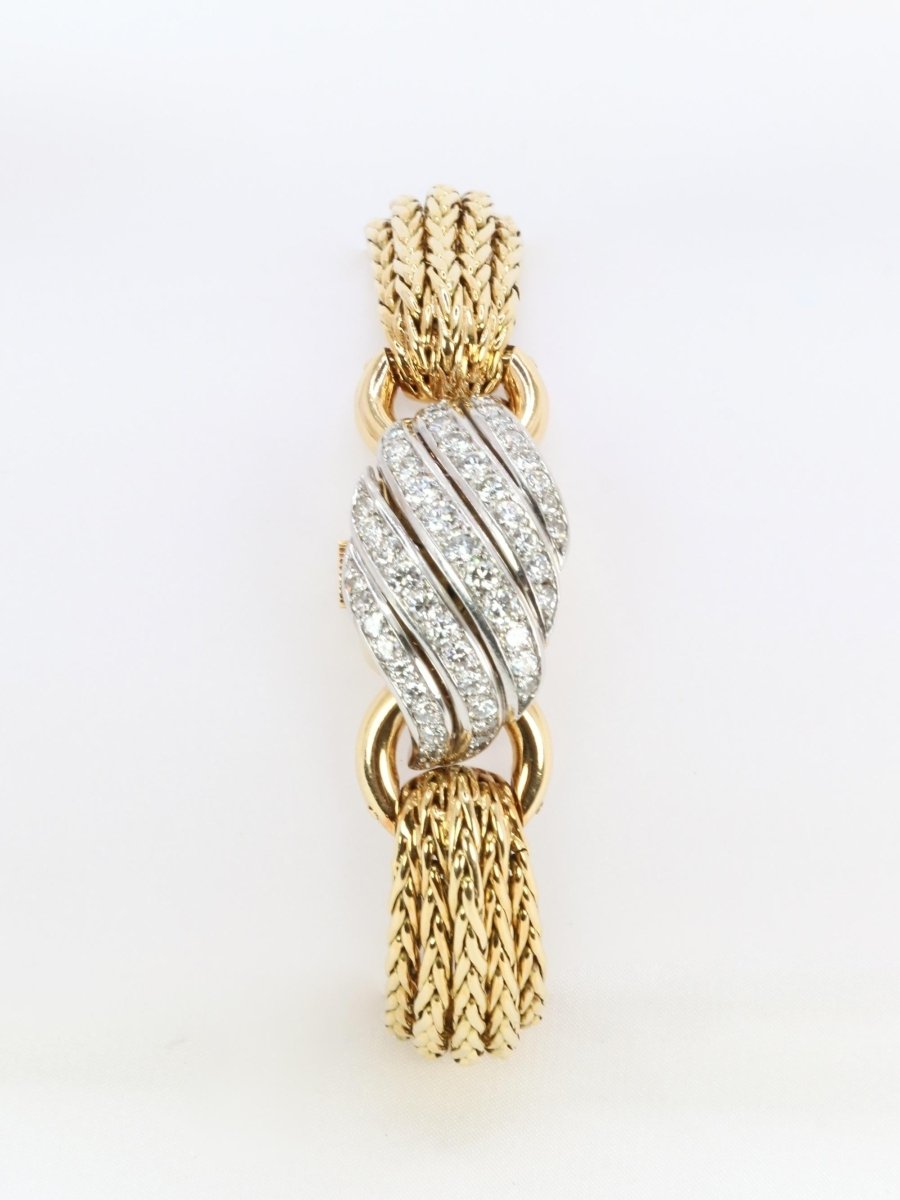 BOUCHERON Montre à secrets or jaune diamants - Castafiore