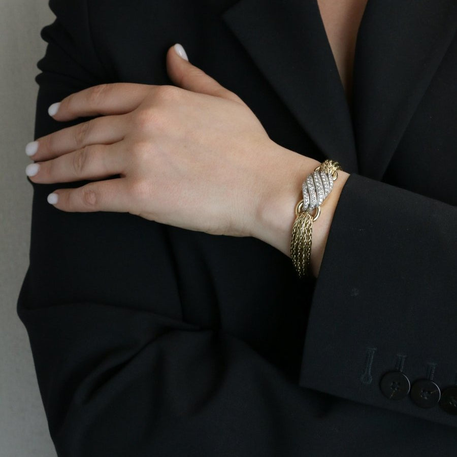 BOUCHERON Montre à secrets or jaune diamants - Castafiore