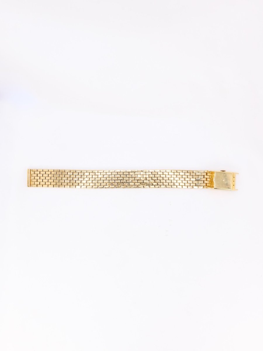 BOUCHERON Montre vintage or jaune - Castafiore