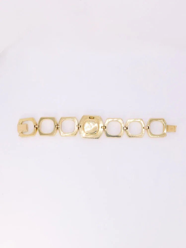 BOUCHERON Montre vintage or jaune maillons carrés arrondis - Castafiore