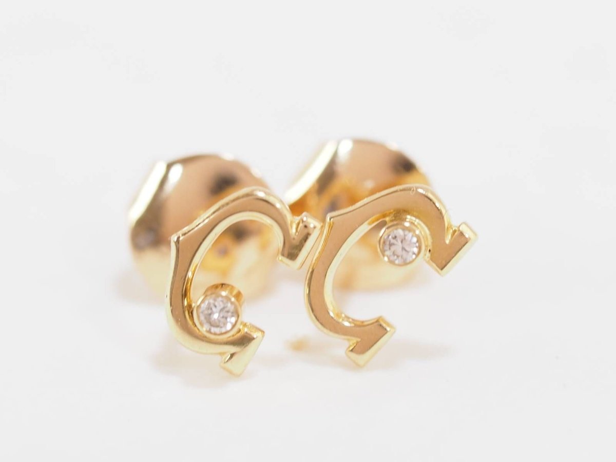 Boucles d'oreilles Cartier C en or jaune et diamants - Castafiore