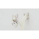 Boucles d'oreilles CHAUMET "Double Liens" en or blanc et diamants - Castafiore